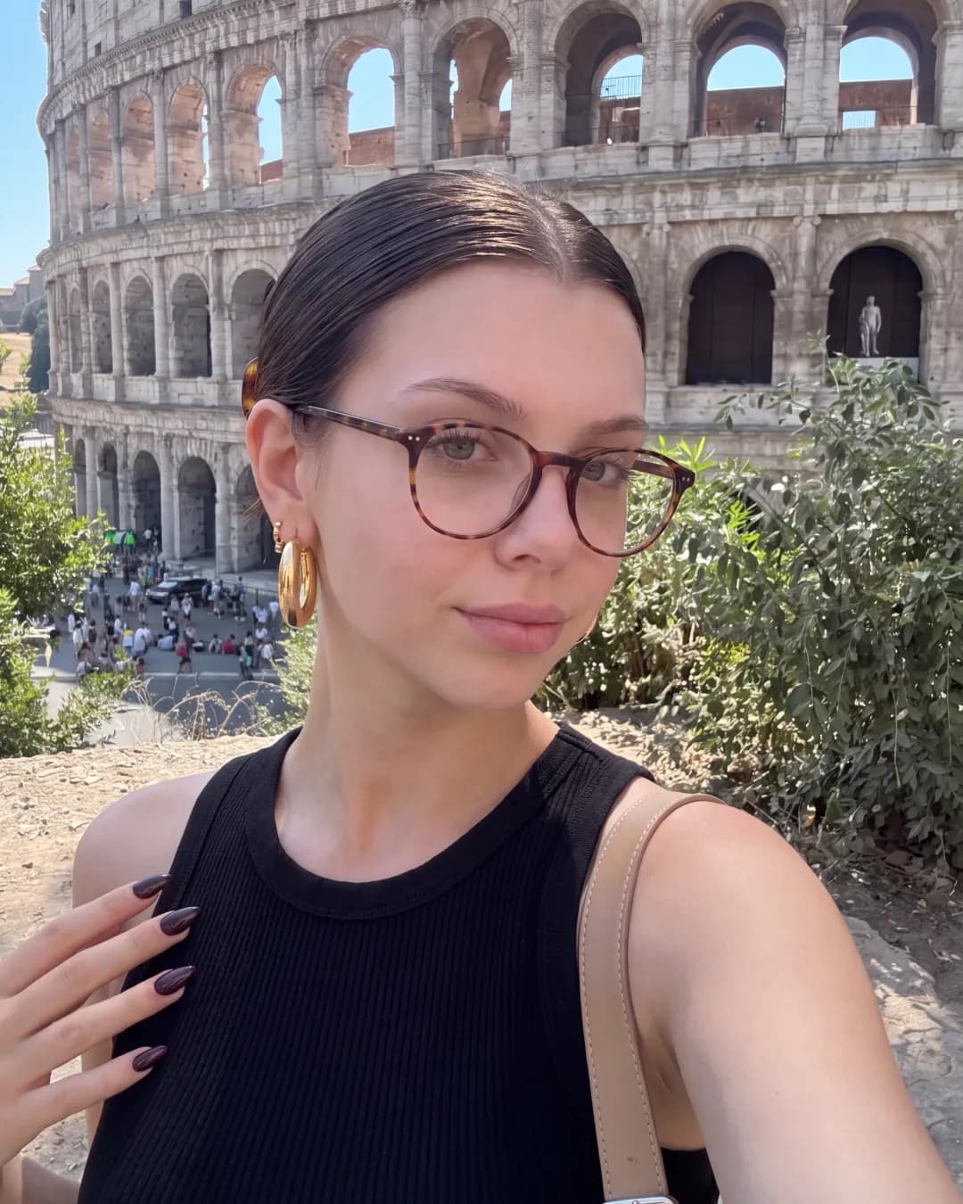 Katherine in front of the Colosseum